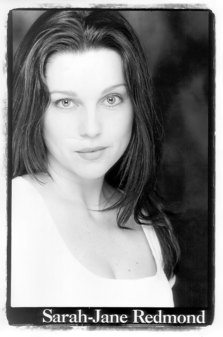 A promotional photograph of the stunning Sarah-Jane Redmond.