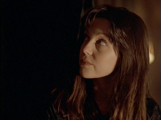 An image of Sarah-Jane Redmond as Lucy Butler in Millennium episode Lamentation.