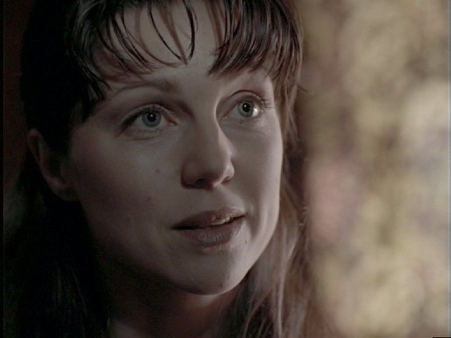 An image of Sarah-Jane Redmond as Lucy Butler in Millennium episode Lamentation.