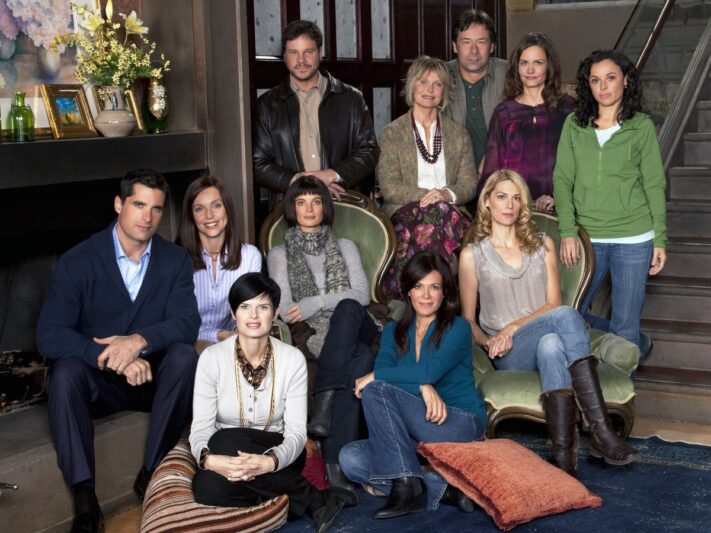 Behind the scenes photo of Sarah-Jane Redmond with cast of Sorority Wars (2009).
