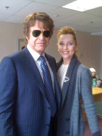 A behind the scenes photo of Sarah-Jane Redmond with actor John Noble (Walter) taken on the set of Fringe.