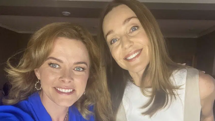 A behind the scenes in production image of Erin Boyes and Sarah-Jane Redmond in Lifetime's Engaged To Be Murdered (2023).