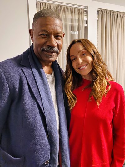 A behind the scenes keepsake photo with actors Dennis Haysbert and Sarah-Jane-Redmond taken on the set of Hallmark's Holidazed.